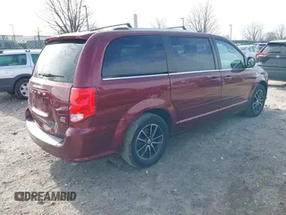 2017 Dodge Grand Caravan SXT with VIN 2C4RDGCGXHR624452, listed as a IAAI auction lot 41624033 with 98,912 mi miles and . Bid and sale history available at DreamBid. Image 4.