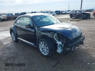 2018 Volkswagen Beetle S with VIN 3VWFD7ATXJM706338, listed as a IAAI auction lot 41293181 with 71,945 mi miles. Bid and sale history available at carsss.com. Image 1.