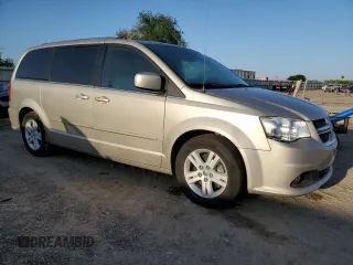 2013 Dodge Grand Caravan Crew with VIN 2C4RDGDG4DR567707, listed as a Copart auction lot 52731005 with 210,359 mi miles and Salvage Title. Bid and sale history available at DreamBid. Image 4.