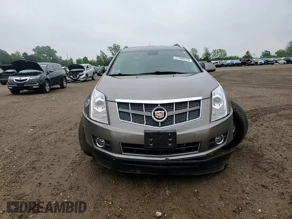 2012 Cadillac SRX Performance Collection z VIN 3GYFNBE35CS536105, wystawiony jako Copart lot #57588275 z przebiegiem 96 359 mil mil oraz Szkoda całkowita • Salvage title. Historia ofert i sprzedaży dostępna na DreamBid. Obrazek 13.