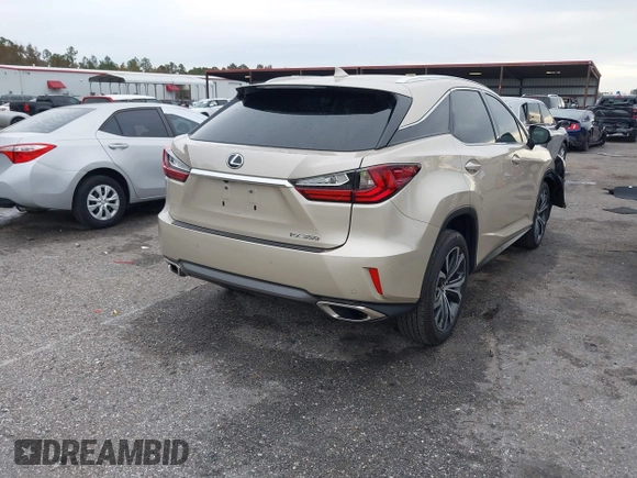 2018 Lexus RX with VIN 2T2ZZMCA9JC099803, listed as a IAAI auction lot 41052078 with 32,423 mi miles. Bid and sale history available at carsss.com. Image 4.