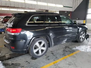 2014 Jeep Grand Cherokee Overland with VIN 1C4RJFCG7EC209452, listed as a Copart auction lot 88752795 with 102,725 mi miles and Salvage Title. Bid and sale history available at carsss.com. Image 3.