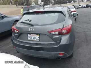 2014 Mazda 3 s Touring with VIN JM1BM1L35E1208952, listed as a IAAI auction lot 42121077 with 183,985 mi miles. Bid and sale history available at carsss.com. Image 17.