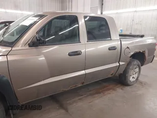 2006 Dodge Dakota SLT with VIN 1D7HE48K36S635377, listed as a IAAI auction lot 42200803 with 156,812 mi miles and . Bid and sale history available at carsss.com. Image 14.