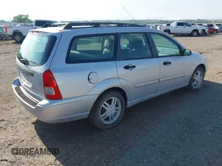 2001 Ford Focus SE z VIN 1FAFP363X1W343475, wystawiony jako IAAI lot #42390133 z przebiegiem 127 282 mil mil oraz . Historia ofert i sprzedaży dostępna na DreamBid. Obrazek 4.