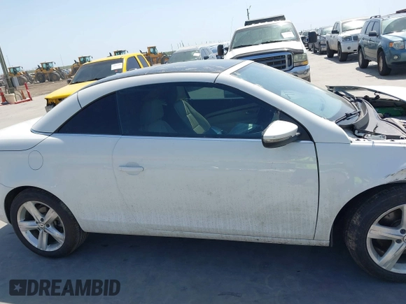 2012 Volkswagen Eos Executive with VIN WVWFW7AH9CV022169, listed as a IAAI auction lot 41795571 with 101,375 mi miles and . Bid and sale history available at DreamBid. Image 13.