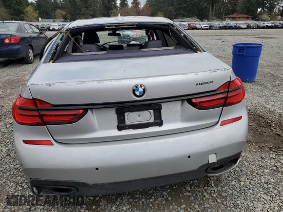 2018 BMW 7 Series 740i with VIN WBA7E2C53JG742711, listed as a Copart auction lot 51643505 with 0 mi miles and Salvage Title. Bid and sale history available at carsss.com. Image 6.
