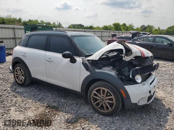 2015 MINI Countryman S with VIN WMWZC3C55FWT03267, listed as a Copart auction lot 59331605 with 116,964 mi miles and Salvage title. Bid and sale history available at DreamBid. Image 4.