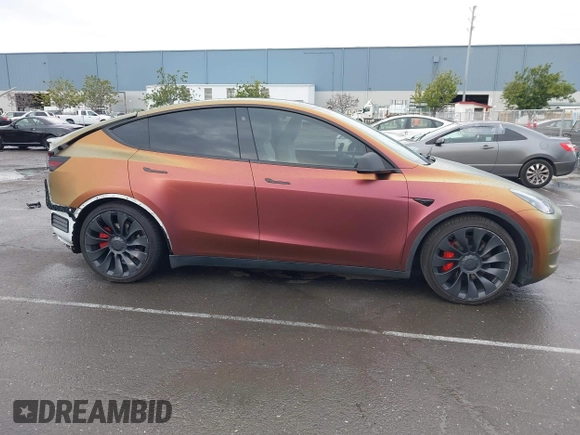 2023 Tesla Model Y Performance with VIN 7SAYGDEF4PF738885, listed as a IAAI auction lot 41798997 with 59,270 mi miles and . Bid and sale history available at DreamBid. Image 14.