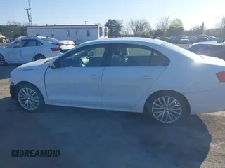 2014 Volkswagen Jetta SEL z VIN 3VWL17AJ8EM336569, wystawiony jako IAAI lot #41975776 z przebiegiem 134 967 mil mil oraz . Historia ofert i sprzedaży dostępna na DreamBid. Obrazek 14.