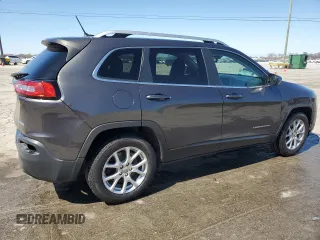 2015 Jeep Cherokee Latitude with VIN 1C4PJLCS0FW707387, listed as a Copart auction lot 48953465 with 140,965 mi miles and Salvage Title. Bid and sale history available at carsss.com. Image 3.