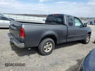 2003 Ford F-150 XL with VIN 1FTRX17L43NA66874, listed as a Copart auction lot 50741395 with 196,161 mi miles and Salvage title. Bid and sale history available at DreamBid. Image 3.