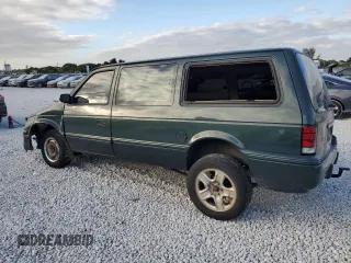 1993 Dodge Caravan Grand SE z VIN 1B4GH44R0PX686790, wystawiony jako Copart lot #83757254 z przebiegiem 287 137 mil mil oraz Szkody całkowita. Historia ofert i sprzedaży dostępna na DreamBid. Obrazek 2.