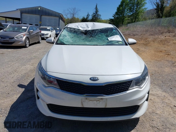 2016 Kia Optima LX z VIN 5XXGT4L3XGG080662, wystawiony jako IAAI lot #42048361 z przebiegiem 99 564 mil mil oraz . Historia ofert i sprzedaży dostępna na DreamBid. Obrazek 12.