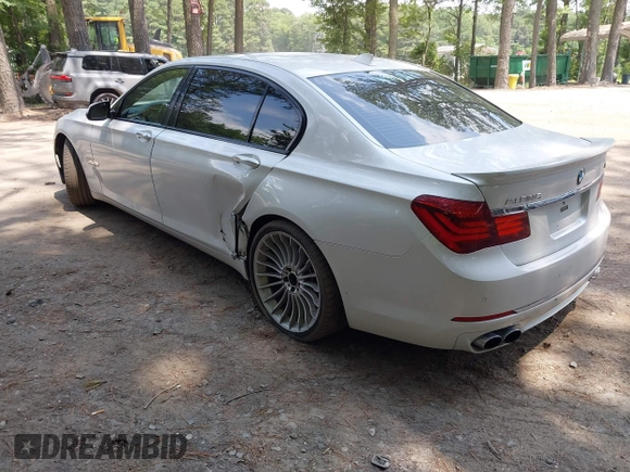 2013 BMW 7 Series 750Li with VIN WBAYE8C55DDS16013, listed as a IAAI auction lot 42709519 with 123,405 mi miles and . Bid and sale history available at DreamBid. Image 3.