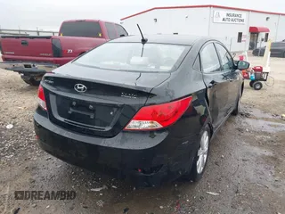 2013 Hyundai Accent GLS with VIN KMHCU4AE9DU379870, listed as a IAAI auction lot 41534029 with 102,610 mi miles. Bid and sale history available at carsss.com. Image 4.
