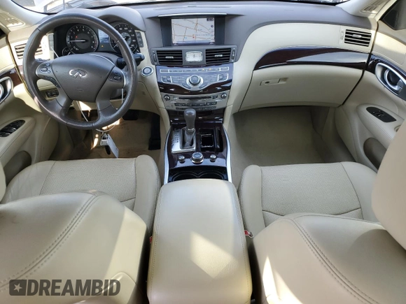2014 Infiniti M37 with VIN JN1BY1AP2EM260051, listed as a Copart auction lot 87276884 with 101,899 mi miles and Salvage Title. Bid and sale history available at carsss.com. Image 8.