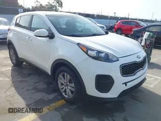 2019 Kia Sportage LX with VIN KNDPM3AC0K7535675, listed as a IAAI auction lot 41933482 with 118,012 mi miles. Bid and sale history available at carsss.com. Image 1.