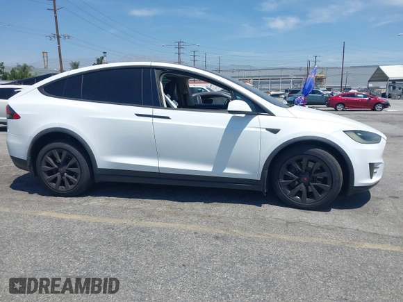 2016 Tesla Model X 70D z VIN 5YJXCAE29GF002170, wystawiony jako IAAI lot #42334842 z przebiegiem 119 104 mil mil oraz . Historia ofert i sprzedaży dostępna na DreamBid. Obrazek 14.