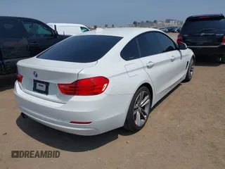 2015 BMW 4 Series 428i with VIN WBA4A9C57FGL86164, listed as a IAAI auction lot 42629769 with 123,984 mi miles and . Bid and sale history available at DreamBid. Image 4.