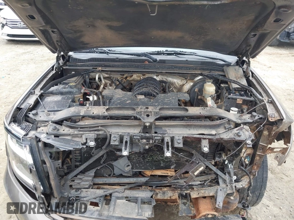 2015 Chevrolet Suburban LT z VIN 1GNSCJKC6FR675585, wystawiony jako IAAI lot #41510570 z przebiegiem 156 818 mil mil oraz . Historia ofert i sprzedaży dostępna na DreamBid. Obrazek 10.