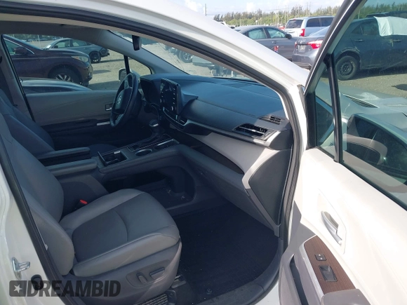 2021 Toyota Sienna XLE with VIN 5TDYRKEC7MS017968, listed as a IAAI auction lot 42145440 with 85,989 mi miles and . Bid and sale history available at DreamBid. Image 5.