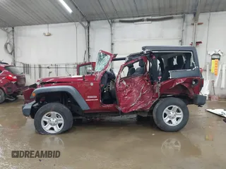 2011 Jeep Wrangler Sport z VIN 1J4AA2D19BL613164, wystawiony jako IAAI lot #42514207 z przebiegiem Nie podano mil oraz . Historia ofert i sprzedaży dostępna na DreamBid. Obrazek 13.