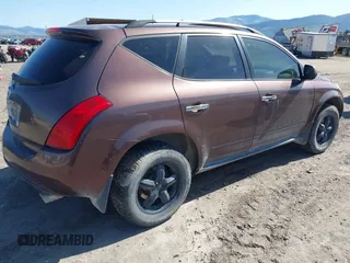 2003 Nissan Murano SL with VIN JN8AZ08W03W218075, listed as a IAAI auction lot 42158632 with 127,762 mi miles and . Bid and sale history available at DreamBid. Image 4.