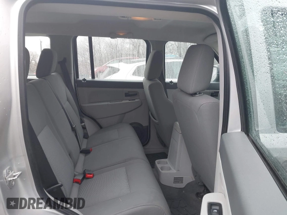 2008 Jeep Liberty Sport with VIN 1J8GN28K48W105949, listed as a IAAI auction lot 41817815 with 87,618 mi miles and . Bid and sale history available at DreamBid. Image 8.