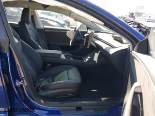 2025 Tesla Model 3 Long Range with VIN 5YJ3E1EB9SF886175, listed as a IAAI auction lot 41648473 with 395 mi miles. Bid and sale history available at carsss.com. Image 5.
