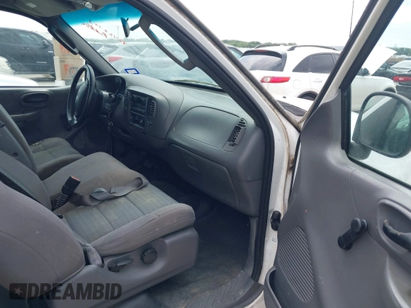 2003 Ford F-150 XL with VIN 1FTRX07263KD53880, listed as a IAAI auction lot 42422353 with 192,630 mi miles and . Bid and sale history available at DreamBid. Image 5.