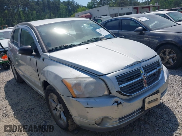2011 Dodge Caliber Mainstreet with VIN 1B3CB3HAXBD107494, listed as a IAAI auction lot 42071328 with 146,936 mi miles. Bid and sale history available at carsss.com. Image 1.