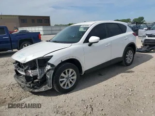 2014 Mazda CX-5 Touring z VIN JM3KE4CY5E0429118, wystawiony jako Copart lot #56539305 z przebiegiem 132 396 mil mil oraz Szkoda całkowita • Salvage title. Historia ofert i sprzedaży dostępna na DreamBid. Obrazek 1.