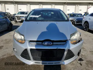 2014 Ford Focus Titanium z VIN 1FADP3N2XEL263357, wystawiony jako Copart lot #84610634 z przebiegiem 142 023 mil mil oraz Nie do naprawy • Non repairable. Historia ofert i sprzedaży dostępna na DreamBid. Obrazek 5.