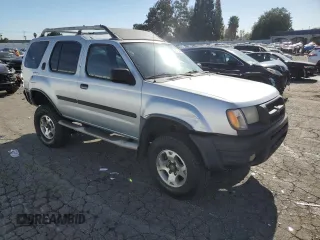 2001 Nissan Xterra XE z VIN 5N1ED28T51C513390, wystawiony jako Copart lot #85260414 z przebiegiem 218 377 mil mil oraz Szkoda całkowita • Salvage title. Historia ofert i sprzedaży dostępna na DreamBid. Obrazek 4.