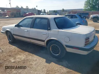 1992 Oldsmobile Cutlass Ciera with VIN 1G3AL54N4N6417365, listed as a IAAI auction lot 42074800 with 306,884 mi miles and . Bid and sale history available at DreamBid. Image 3.