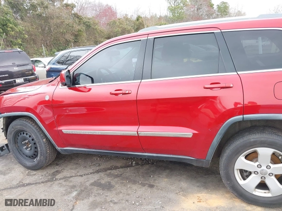 2011 Jeep Grand Cherokee Laredo with VIN 1J4RR4GT8BC636651, listed as a IAAI auction lot 41768944 with 200,160 mi miles. Bid and sale history available at carsss.com. Image 14.