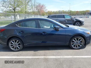 2018 Mazda 3 Grand Touring with VIN 3MZBN1W36JM213063, listed as a IAAI auction lot 42102460 with 49,180 mi miles and . Bid and sale history available at DreamBid. Image 13.
