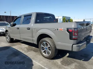 2020 Ford F-150 XL with VIN 1FTEW1CP0LFA72448, listed as a Copart auction lot 59237885 with 87,060 mi miles and Salvage title. Bid and sale history available at DreamBid. Image 2.