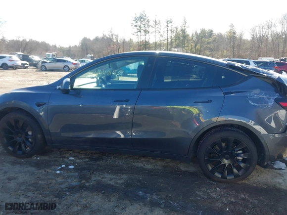 2023 Tesla Model Y Long Range with VIN 7SAYGAEE9PF905943, listed as a IAAI auction lot 41444255 with 11,179 mi miles. Bid and sale history available at carsss.com. Image 13.