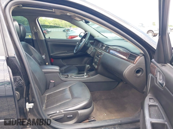 2014 Chevrolet Impala LTZ with VIN 2G1WC5E31E1111954, listed as a IAAI auction lot 42159562 with 203,496 mi miles and . Bid and sale history available at DreamBid. Image 5.