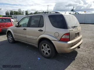 2001 Mercedes-Benz M-Class with VIN 4JGAB72EX1A243970, listed as a Copart auction lot 61308054 with 133,461 mi miles and Salvage Title. Bid and sale history available at carsss.com. Image 2.