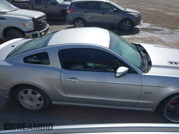 2013 Ford Mustang GT with VIN 1ZVBP8CF7D5216131, listed as a IAAI auction lot 41648862 with 107,983 mi miles. Bid and sale history available at carsss.com. Image 13.