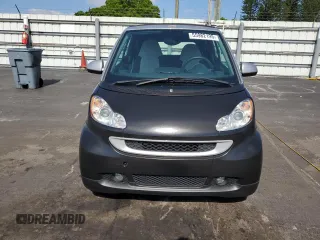 2009 Smart fortwo Passion with VIN WMEEK31X59K232027, listed as a Copart auction lot 55982195 with 63,945 mi miles and Salvage Title. Bid and sale history available at DreamBid. Image 5.