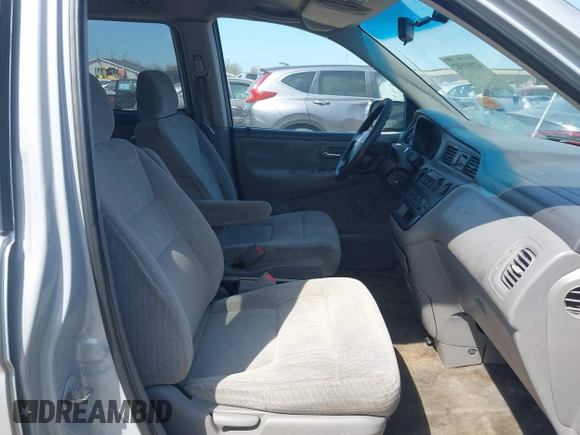 2002 Honda Odyssey LX z VIN 2HKRL18532H567409, wystawiony jako IAAI lot #42069502 z przebiegiem 173 662 mil mil oraz . Historia ofert i sprzedaży dostępna na DreamBid. Obrazek 5.