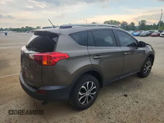 2015 Toyota RAV4 LE with VIN 2T3BFREV9FW391217, listed as a Copart auction lot 61019525 with 84,908 mi miles and Salvage title. Bid and sale history available at DreamBid. Image 3.