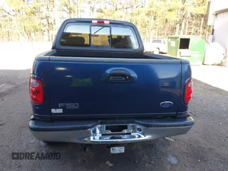 2002 Ford F-150 XLT with VIN 1FTRW086X2KE17566, listed as a IAAI auction lot 41721236 with 98,524 mi miles. Bid and sale history available at carsss.com. Image 16.