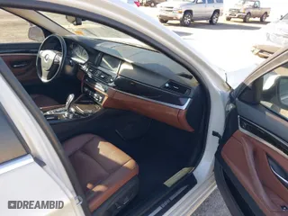 2014 BMW 5 Series 528i with VIN WBA5A5C57ED504582, listed as a IAAI auction lot 41699668 with 113,792 mi miles. Bid and sale history available at carsss.com. Image 5.