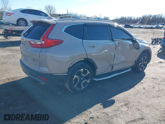 2017 Honda CR-V Touring with VIN 5J6RW2H94HL013536, listed as a IAAI auction lot 41577317 with 97,132 mi miles. Bid and sale history available at carsss.com. Image 4.