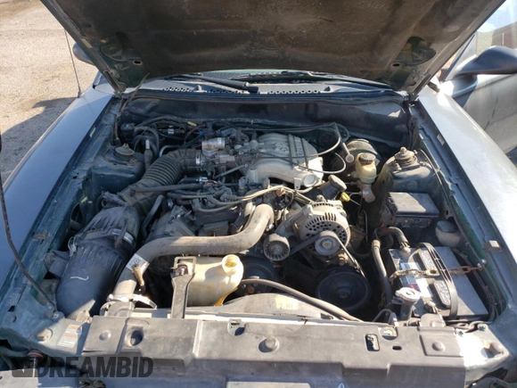 1998 Ford Mustang with VIN 1FAFP444XWF176396, listed as a Copart auction lot 61322984 with 86,168 mi miles and Salvage title. Bid and sale history available at DreamBid. Image 12.